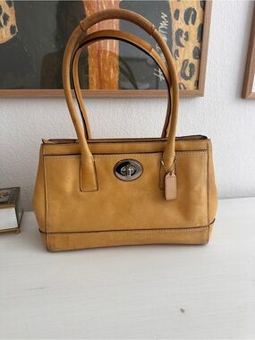 Coach Mustard Leather shoulder Bag with Turn-Lock Closure